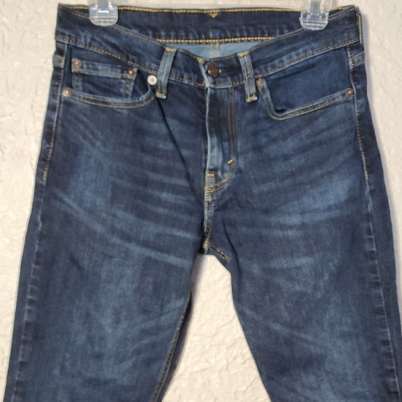 Dark Blue Skinny Jeans with Tapered Legs and Faded Thighs - Picture 3 of 7